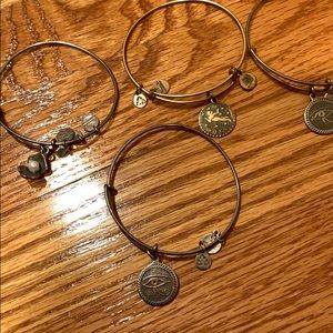 5 Alex & Ani bracelets plus earrings